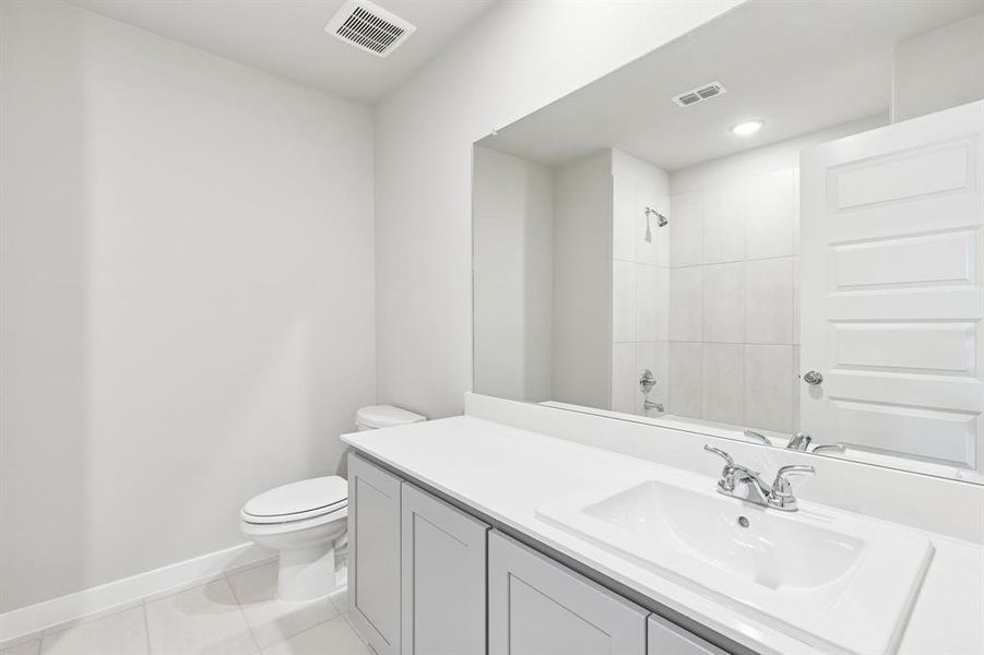 Bathroom in the Haylee home plan by Trophy Signature Homes - REPRESENTATIVE PHOTO Bathroom in the Haylee home plan by Trophy Signature Homes - REPRESENTATIVE PHOTO