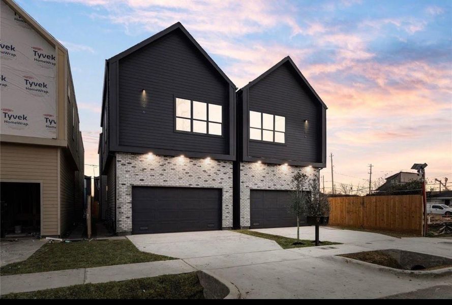 Front exterior of a new home in , Houston, TX, highlighting curb appeal (Image 25).