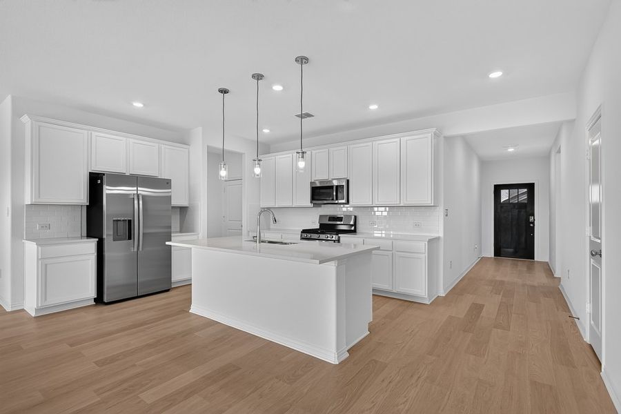 Furnished interior view inside a new home in Parks at Foster Crossing, Anna (Image 7).