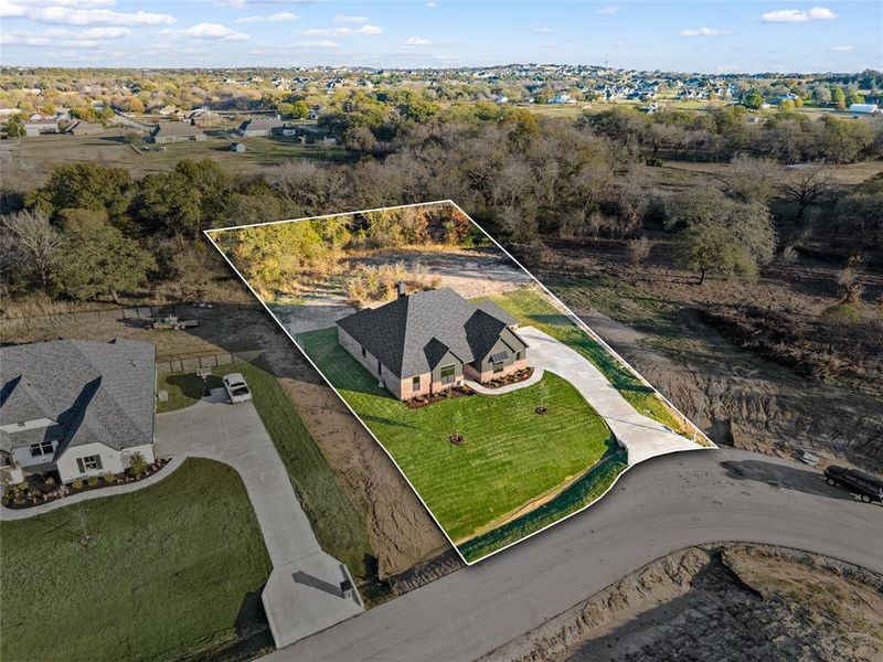 Front exterior of a new home in , Weatherford, TX, highlighting curb appeal (Image 17). Front exterior of a new home in , Weatherford, TX, highlighting curb appeal (Image 17).