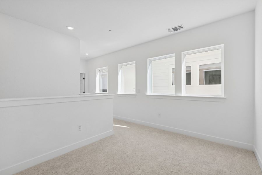 Spacious, unfurnished interior of a new home in The Twilight at Goodnight Ranch, Austin (Image 11).