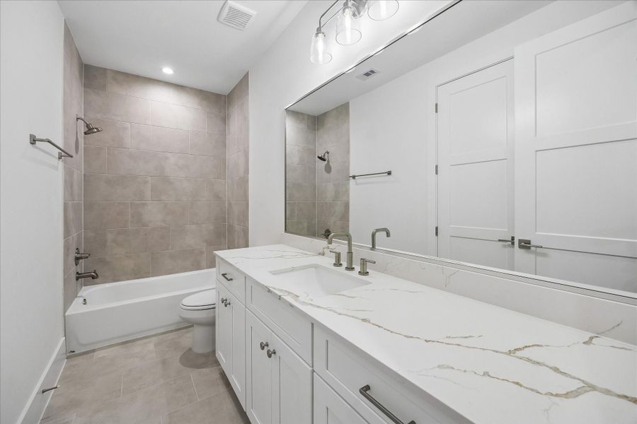 Furnished interior view inside a new home in West 21st Residences, Houston (Image 16).