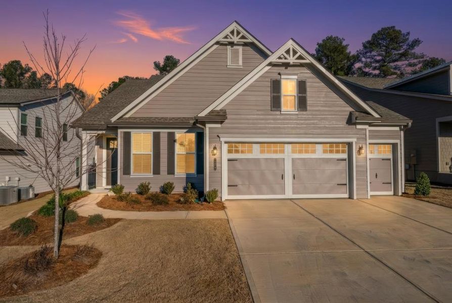 Front exterior of a new home in , Hoschton, GA, highlighting curb appeal (Image 25).