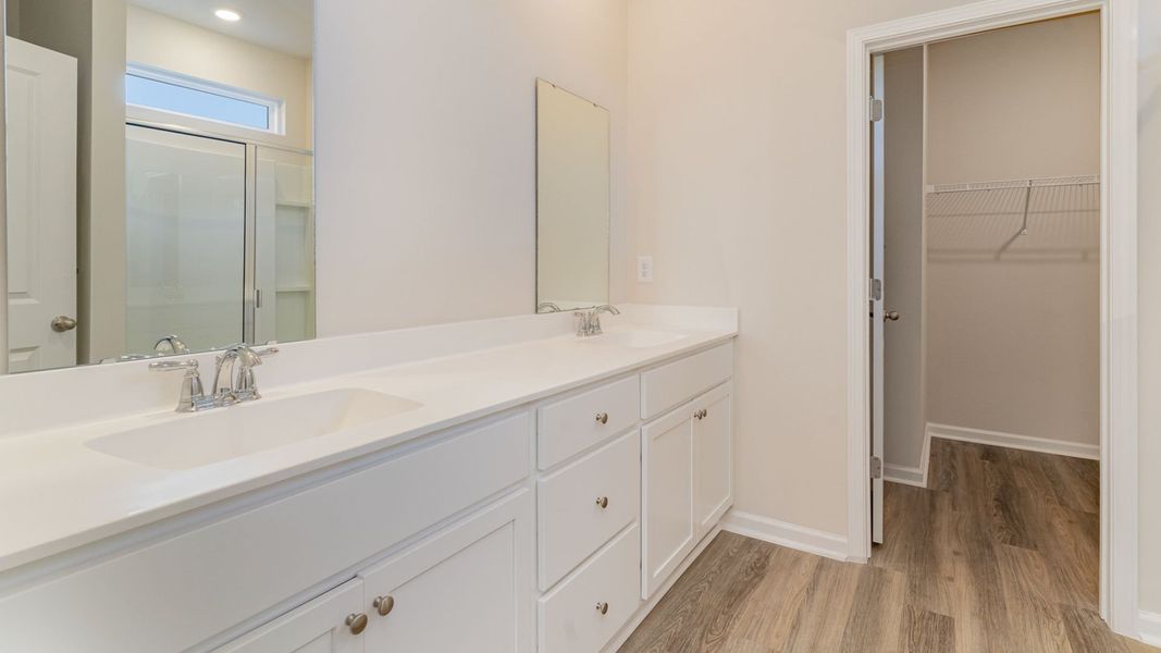 Representative furnished interior of a home built from the WREN by D.R. Horton in Saltgrass Landing, Winnabow (Image 11).