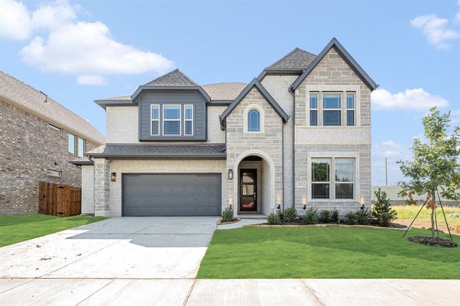 Front exterior of a new home in Ridge Ranch Classic 50, Mesquite, TX, highlighting curb appeal (Image 28). Front exterior of a new home in Ridge Ranch Classic 50, Mesquite, TX, highlighting curb appeal (Image 28).