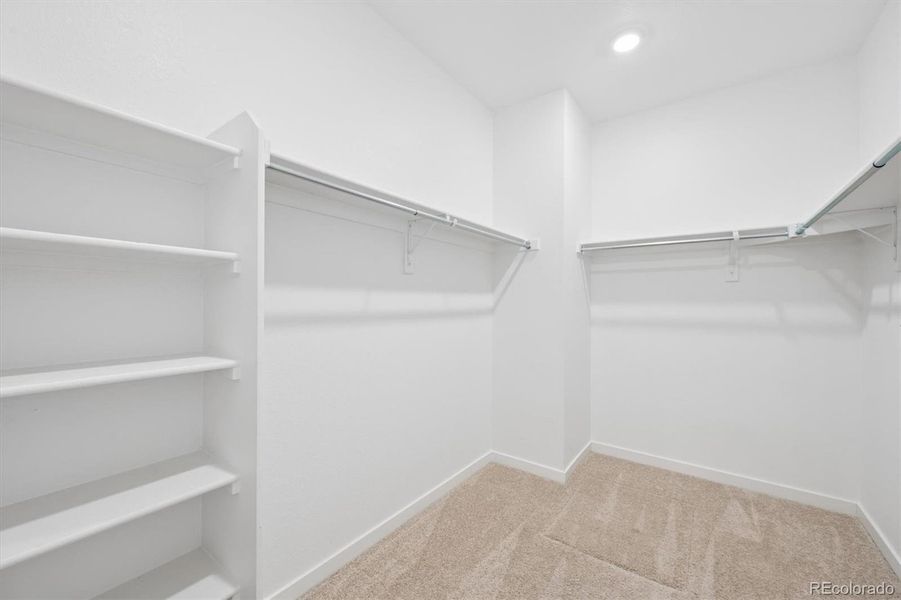 HUGE primary bedroom walk in closet. HUGE primary bedroom walk in closet.