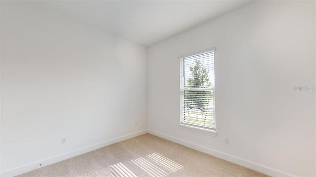 Spacious, unfurnished interior of a new home in Esplanade at Wiregrass Ranch, Wesley Chapel (Image 20).