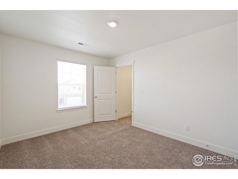 Spacious, unfurnished interior of a new home in Ridge at Johnstown, Johnstown (Image 14).