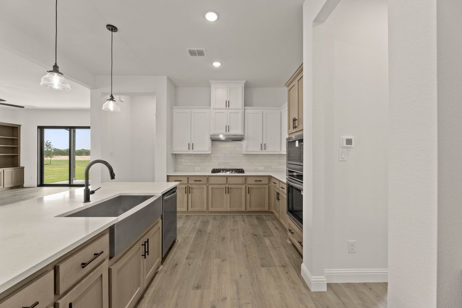 Furnished interior view inside a new home in Settler's Glen, New Fairview (Image 9).