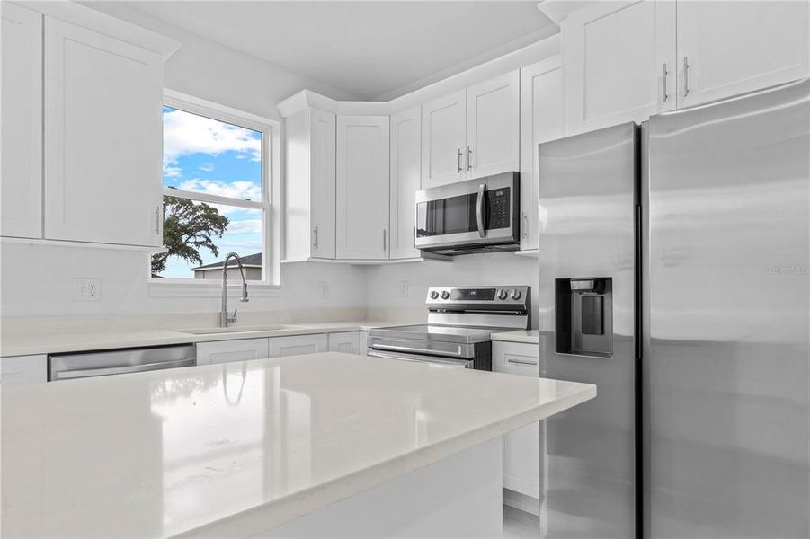 Furnished interior view inside a new home in , Dunnellon (Image 6).