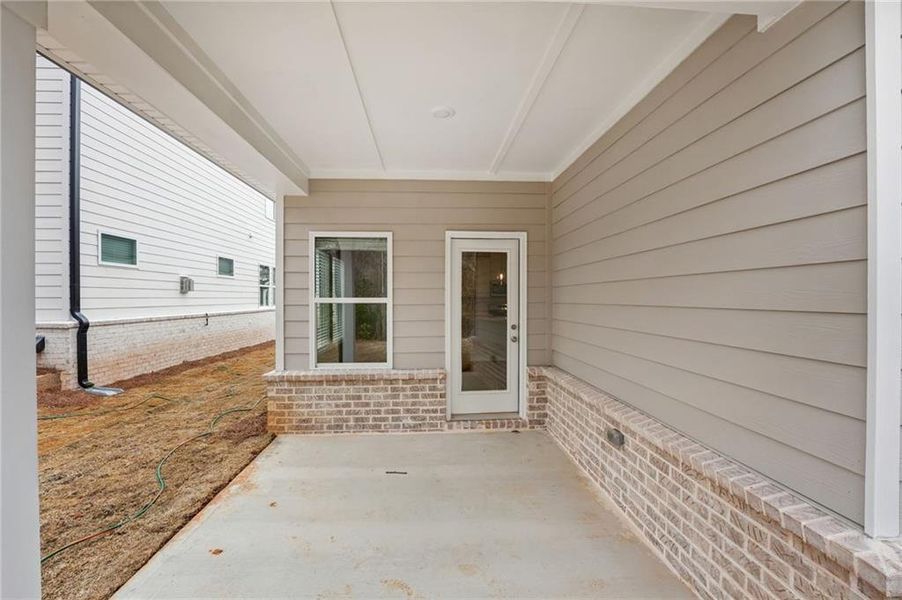 Exterior details and patio area of a home in Westmont Preserve, Powder Springs (Image 35).