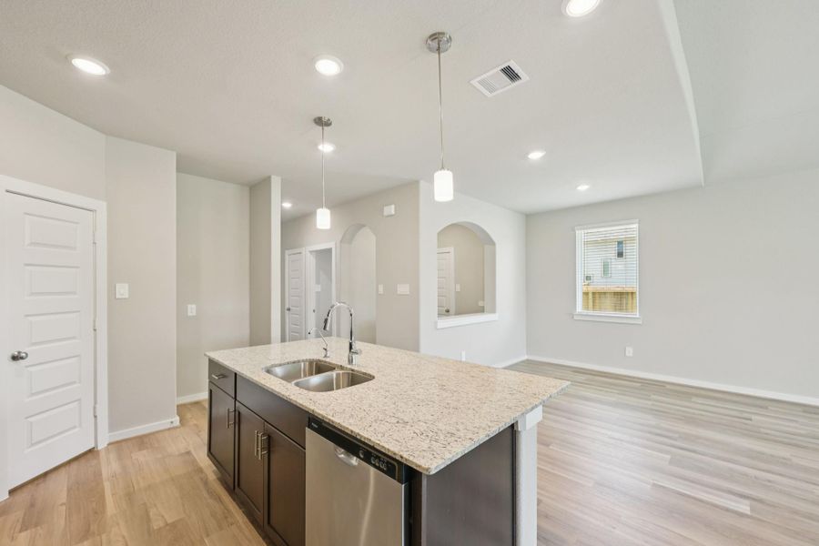 Furnished interior view inside a new home in Sundance Cove - Premier Series, Crosby (Image 14).