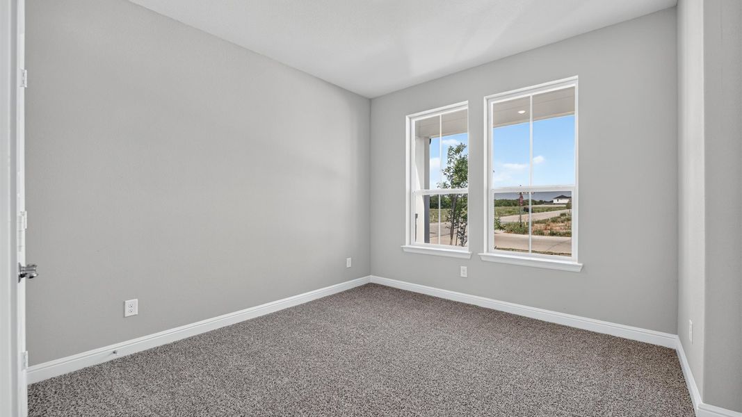 Representative unfurnished interior of a home built from the Tallow by D.R. Horton in Treeline, Justin (Image 34).