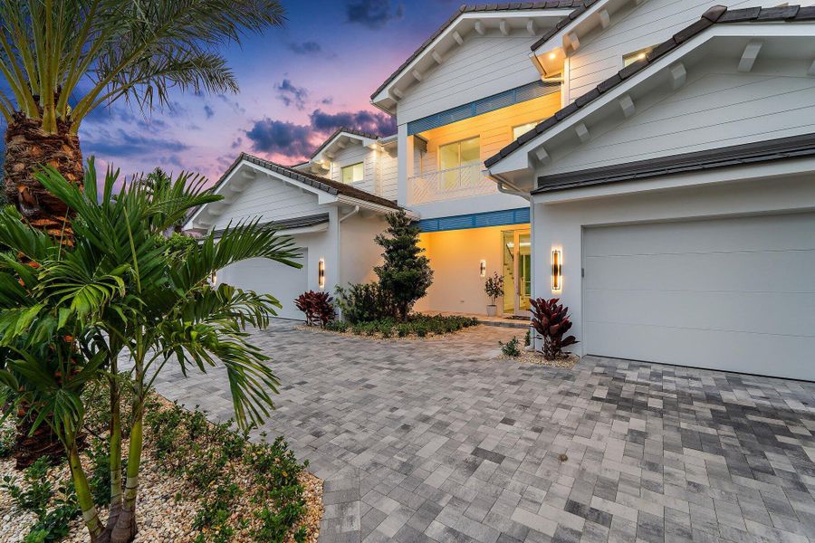Front exterior of a new home in , Tequesta, FL, highlighting curb appeal (Image 38). Front exterior of a new home in , Tequesta, FL, highlighting curb appeal (Image 38).