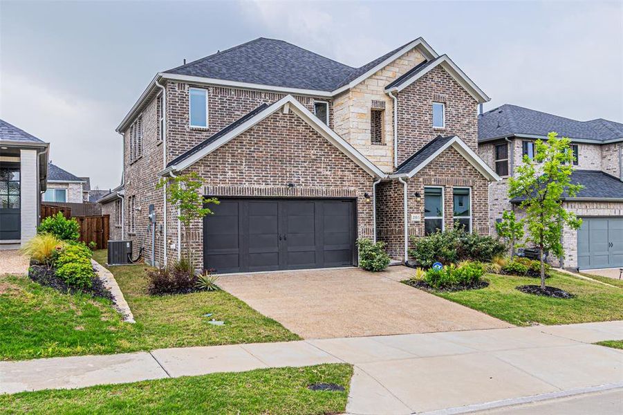 Front exterior of a new home in Stoneridge, Melissa, TX, highlighting curb appeal (Image 25).