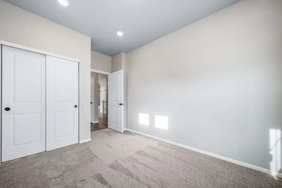 Spacious, unfurnished interior of a new home in The Reserve at Green Valley Ranch, Aurora (Image 23).