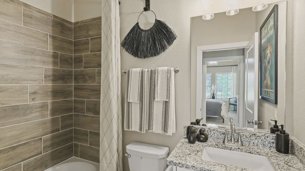 Representative furnished interior of a home built from the Oxford by Chesmar Homes in Bridgeland 45's, Cypress (Image 6).