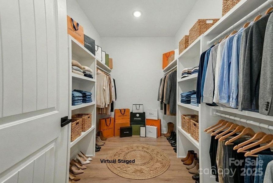 Walk-in closet, tons of built-in shelves. Plenty of storage! Walk-in closet, tons of built-in shelves. Plenty of storage!
