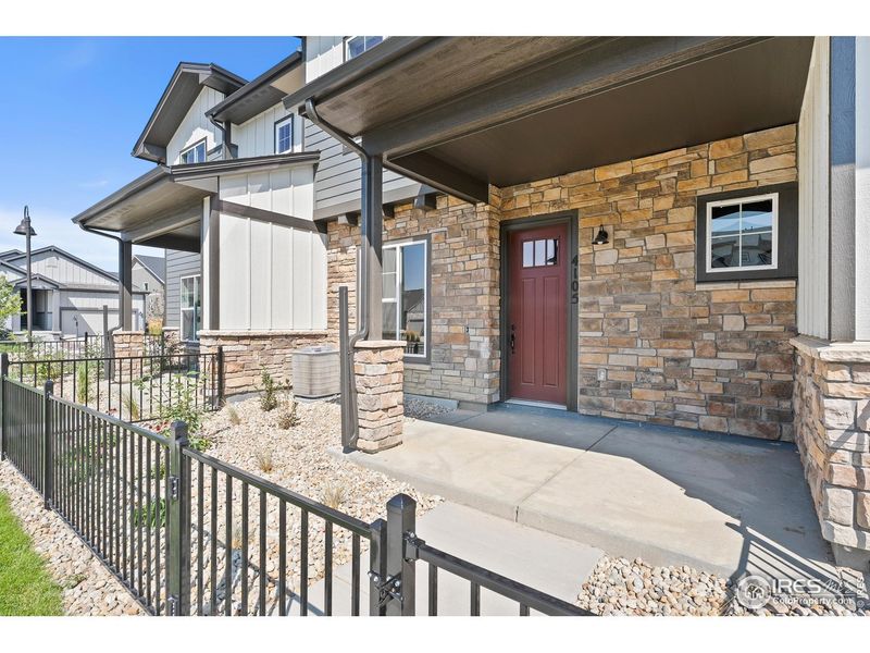 Exterior details and patio area of a home in The Lakes at Centerra - Discovery, Loveland (Image 20).