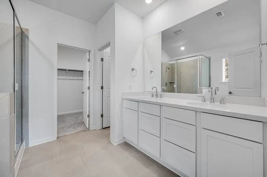 Representative furnished interior of a home built from the Mockingbird by Taylor Morrison in Longview 50s, Del Valle (Image 4).