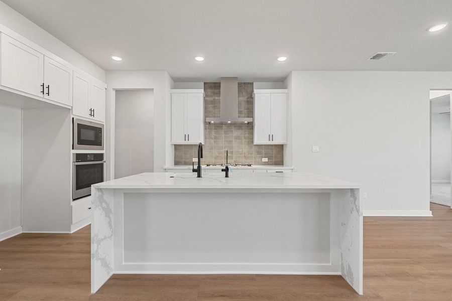 Furnished interior view inside a new home in Terrace Collection at Heritage, Dripping Springs (Image 11). Furnished interior view inside a new home in Terrace Collection at Heritage, Dripping Springs (Image 11).