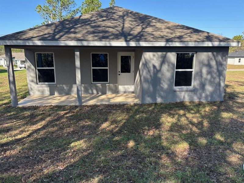 Exterior details and patio area of a home in , Citrus Springs (Image 18).