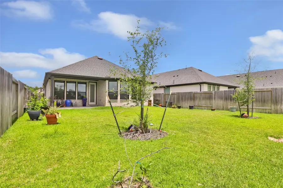 Exterior details and patio area of a home in , Tomball (Image 24). Exterior details and patio area of a home in , Tomball (Image 24).
