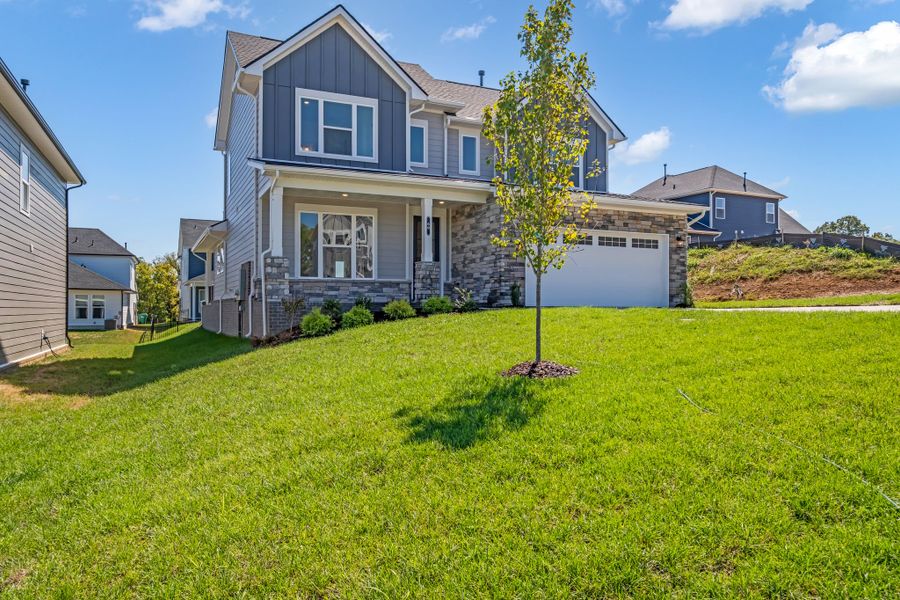 Exterior details and patio area of a home in The Preserve at Five Oaks, Lebanon (Image 19).