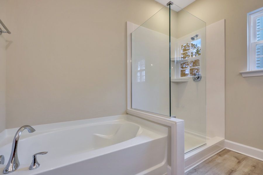 Hatteras – Primary Bath with Soaking Tub and Marble Shower
