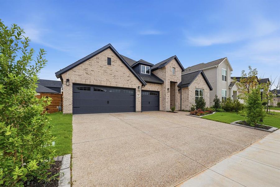 Front exterior of a new home in Solterra Texas, Mesquite, TX, highlighting curb appeal (Image 21). Front exterior of a new home in Solterra Texas, Mesquite, TX, highlighting curb appeal (Image 21).
