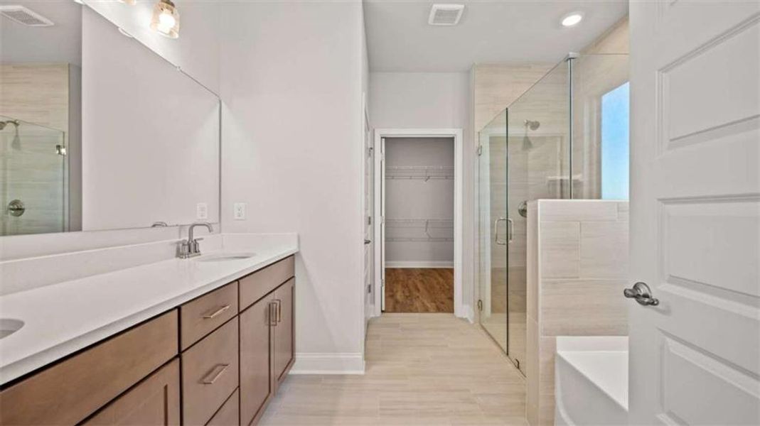 Furnished interior view inside a new home in Oak Ridge Meadows - Active Adult, Locust Grove (Image 7).