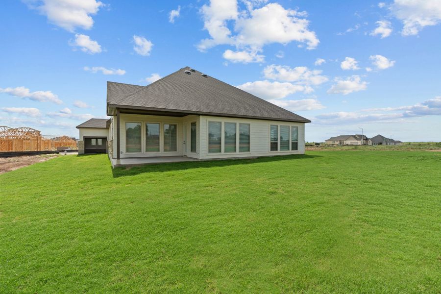 Representative exterior photo of a completed home built from the Drake by Chesmar Homes in Sienna Lakes, San Antonio, TX (Image 12).