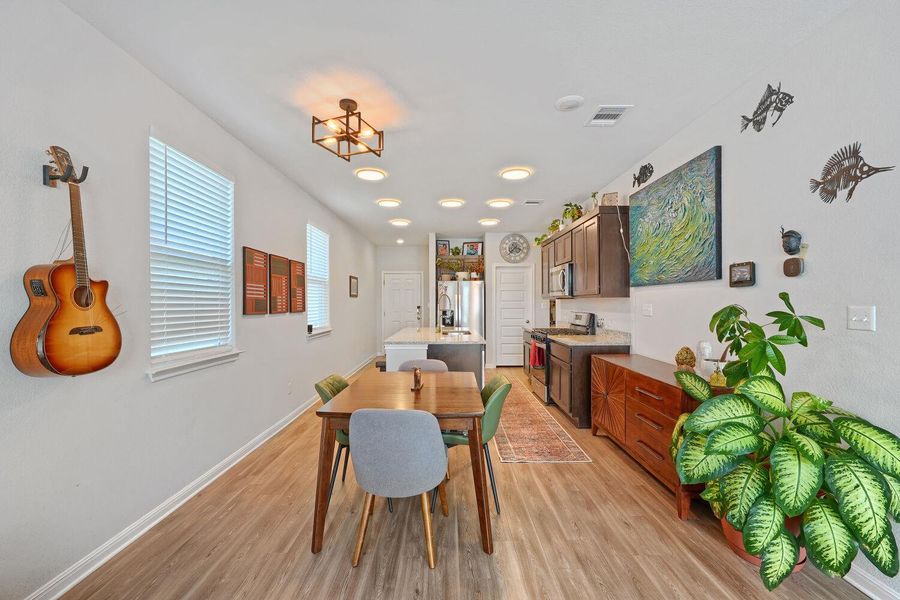 Furnished interior view inside a new home in Stallion Run, Buda (Image 6).