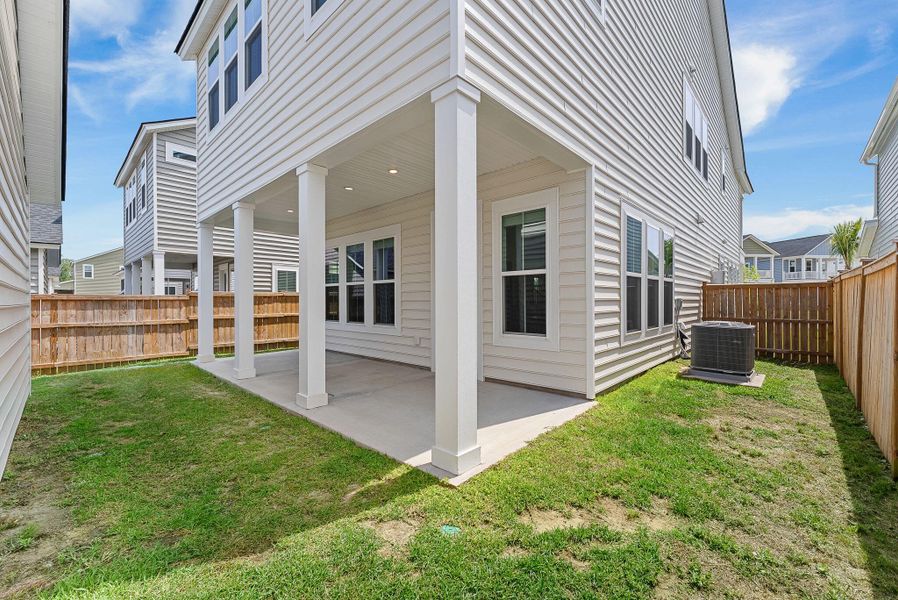 Exterior details and patio area of a home in Heron's Walk at Summers Corner, Summerville (Image 29).