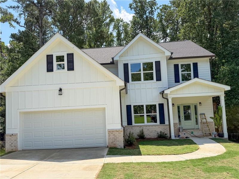 Front exterior of a new home in , Norcross, GA, highlighting curb appeal (Image 31). Front exterior of a new home in , Norcross, GA, highlighting curb appeal (Image 31).
