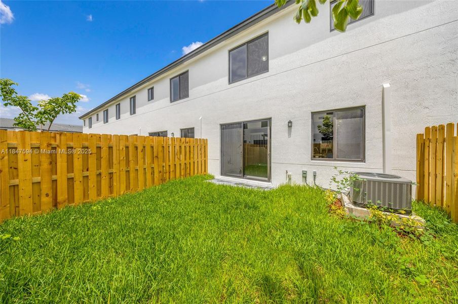 Front exterior of a new home in , Homestead, FL, highlighting curb appeal (Image 15).
