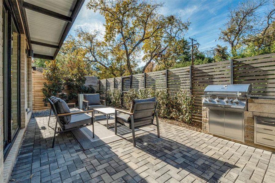 Ground level Patio with Cooktop and Fountain Ground level Patio with Cooktop and Fountain