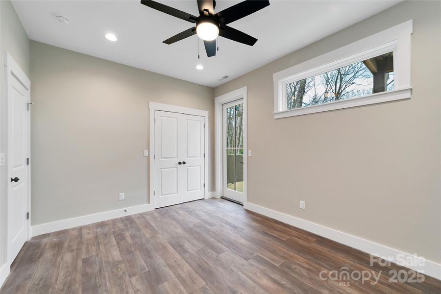 Spacious, unfurnished interior of a new home in , Pisgah Forest (Image 34).