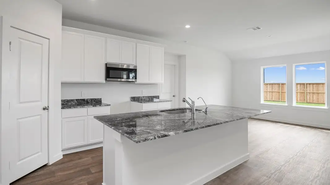 Furnished interior view inside a new home in Tamarron, Fulshear (Image 11).