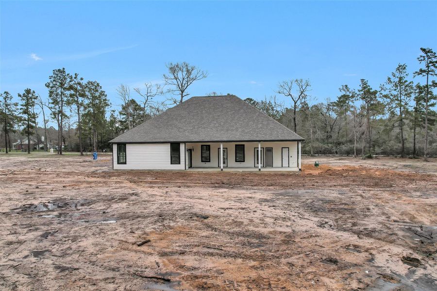 Current rear view of the home. Current rear view of the home.