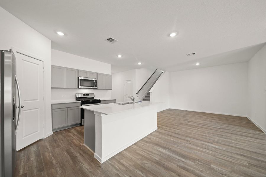 Furnished interior view inside a new home in Grand Pines, Magnolia (Image 7). Furnished interior view inside a new home in Grand Pines, Magnolia (Image 7).