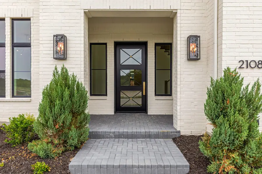 Representative exterior details of a home built from the 7042 by Tradition Homes in Mustang Lakes, McKinney (Image 3).