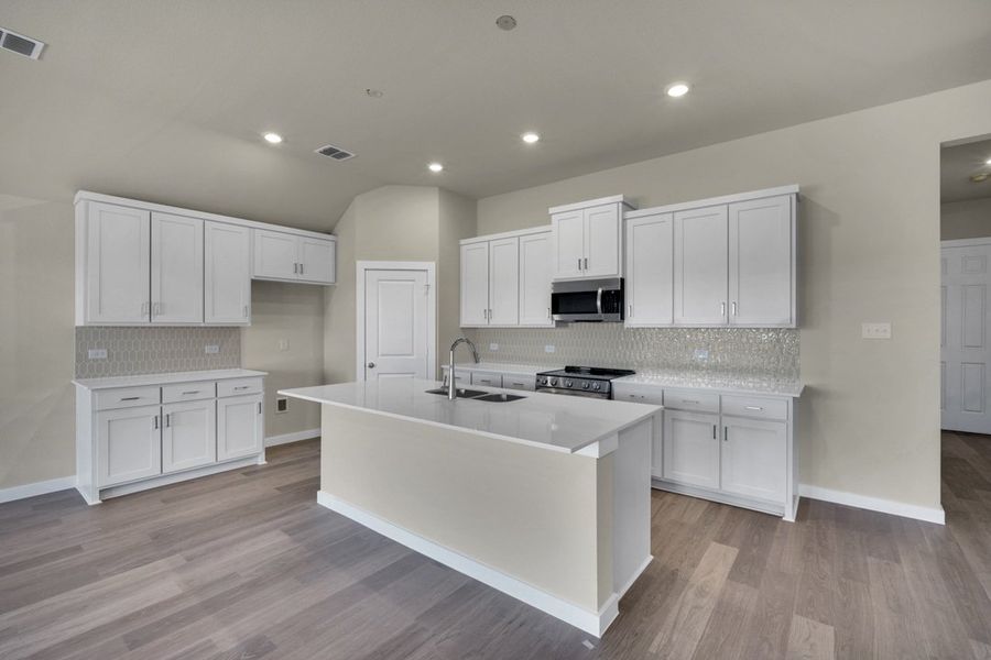 Representative furnished interior of a home built from the The Amherst by Lillian Custom Homes in Tabor Ranch, Ponder (Image 8). Representative furnished interior of a home built from the The Amherst by Lillian Custom Homes in Tabor Ranch, Ponder (Image 8).