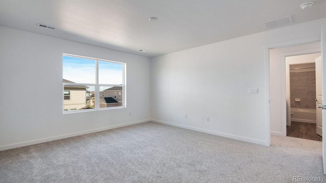 Spacious, unfurnished interior of a new home in Sky Ranch, Watkins (Image 33).