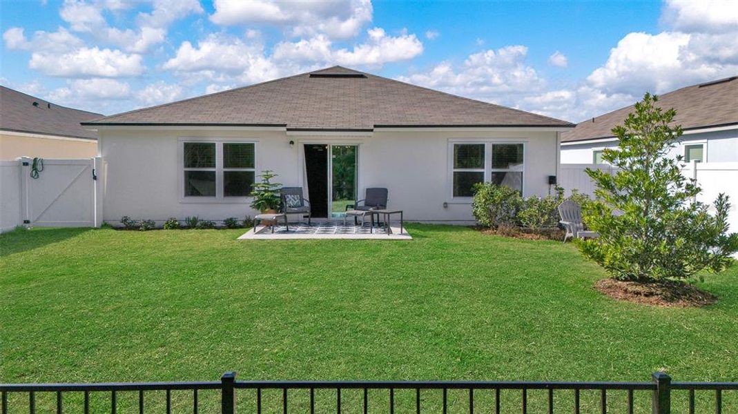 Exterior details and patio area of a home in Sawmill Branch, Palm Coast (Image 29).