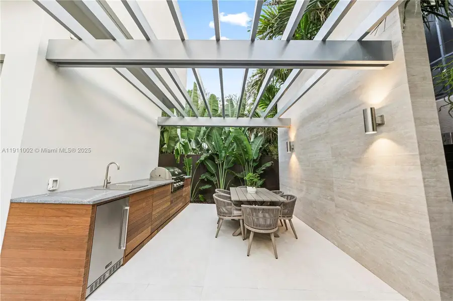 Exterior details and patio area of a home in , Miami (Image 3). Exterior details and patio area of a home in , Miami (Image 3).