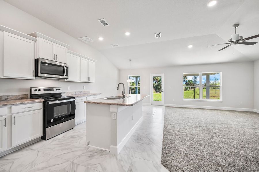 Representative furnished interior of a home built from the 2000 by Adams Homes in Winding Oaks, Weeki Wachee (Image 5).