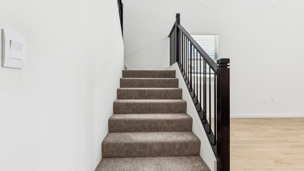 Representative unfurnished interior of a home built from the Phoenician by D.R. Horton in The Ridge at Stone Butte, Phoenix (Image 24). Representative unfurnished interior of a home built from the Phoenician by D.R. Horton in The Ridge at Stone Butte, Phoenix (Image 24).