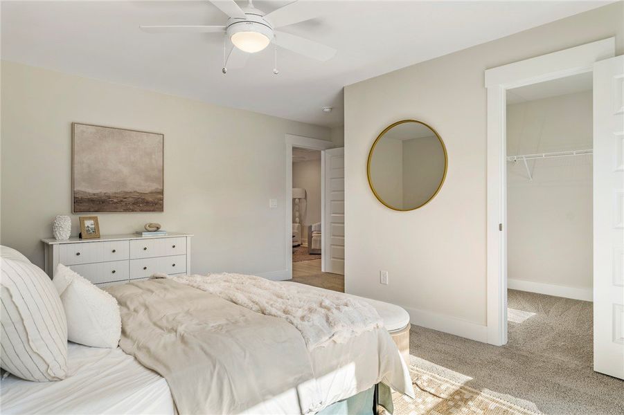 This airy bedroom offers a serene retreat with a c This airy bedroom offers a serene retreat with a c