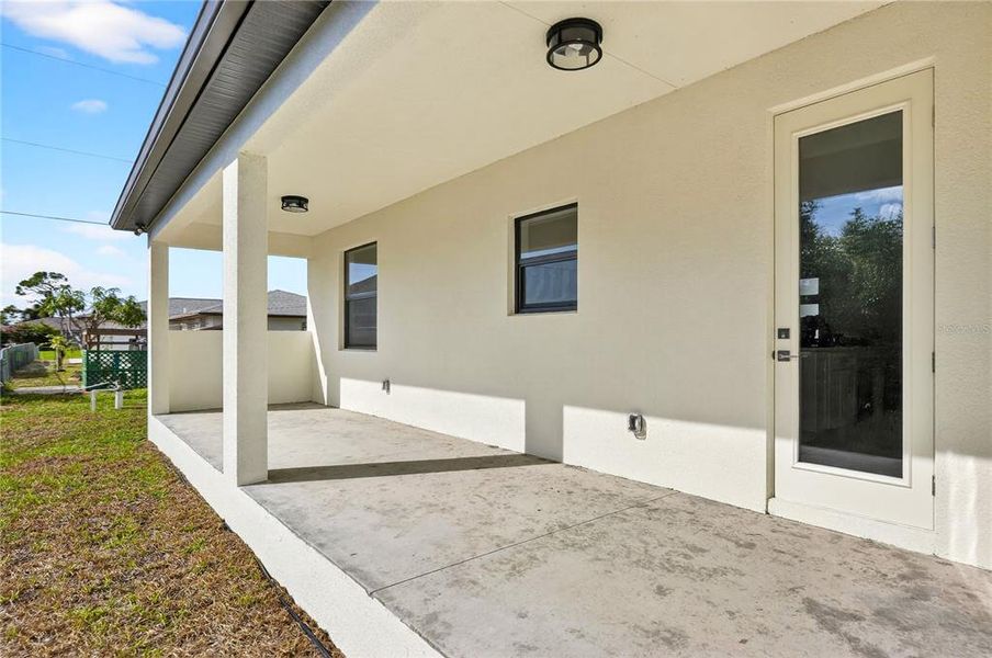 Exterior details and patio area of a home in , North Port (Image 30).
